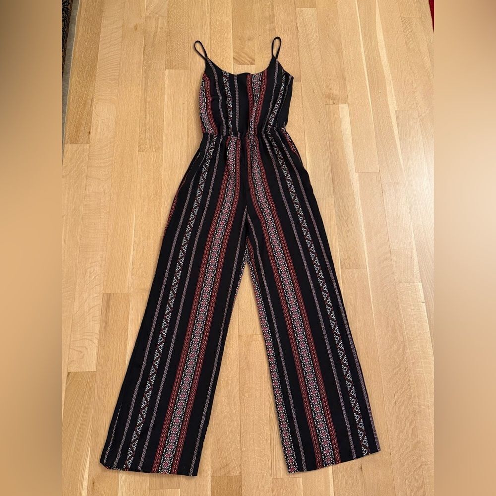 Dynamite Black and Red Jumpsuit with Flowing Silhouette